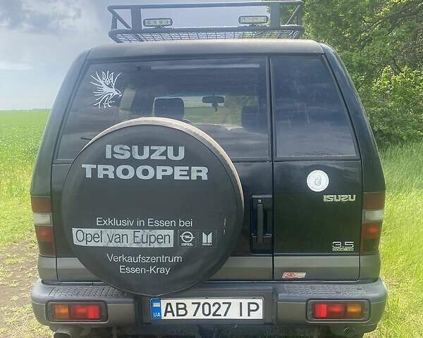 Чорний Ісузу Trooper, об'ємом двигуна 3.5 л та пробігом 386 тис. км за 7900 $, фото 1 на Automoto.ua