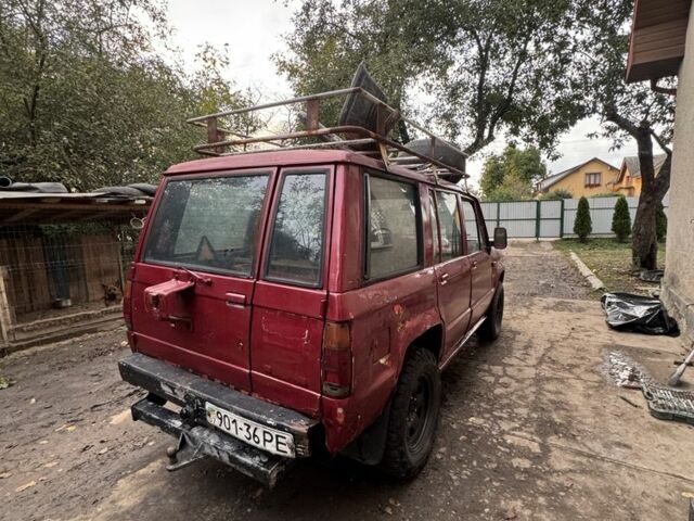 Червоний Ісузу Trooper, об'ємом двигуна 2.5 л та пробігом 200 тис. км за 1700 $, фото 3 на Automoto.ua