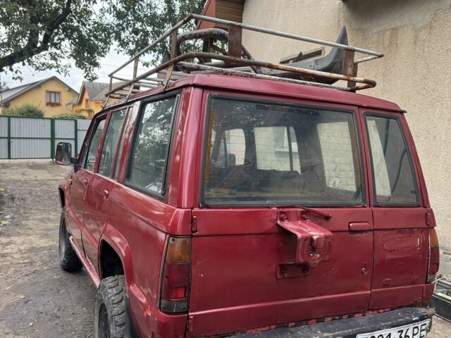 Червоний Ісузу Trooper, об'ємом двигуна 2.5 л та пробігом 200 тис. км за 1700 $, фото 2 на Automoto.ua