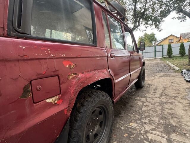 Червоний Ісузу Trooper, об'ємом двигуна 2.5 л та пробігом 200 тис. км за 1700 $, фото 4 на Automoto.ua