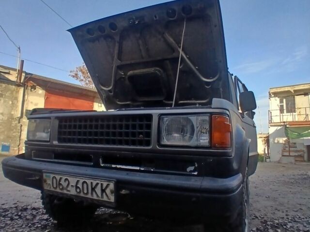 Серый Исузу Трупер, объемом двигателя 2.5 л и пробегом 200 тыс. км за 2612 $, фото 4 на Automoto.ua