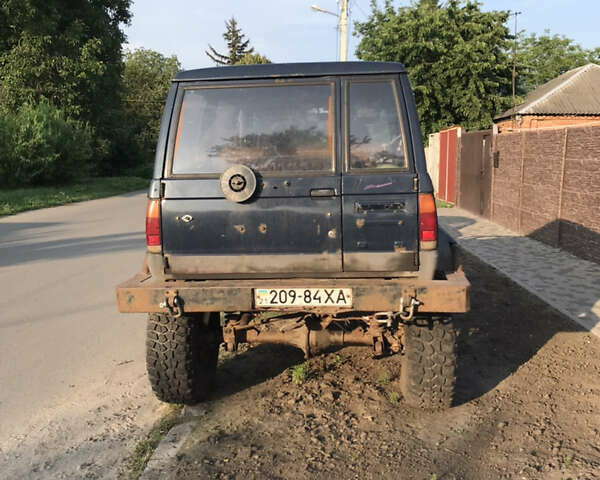 Синій Ісузу Trooper, об'ємом двигуна 2.3 л та пробігом 177 тис. км за 4400 $, фото 3 на Automoto.ua