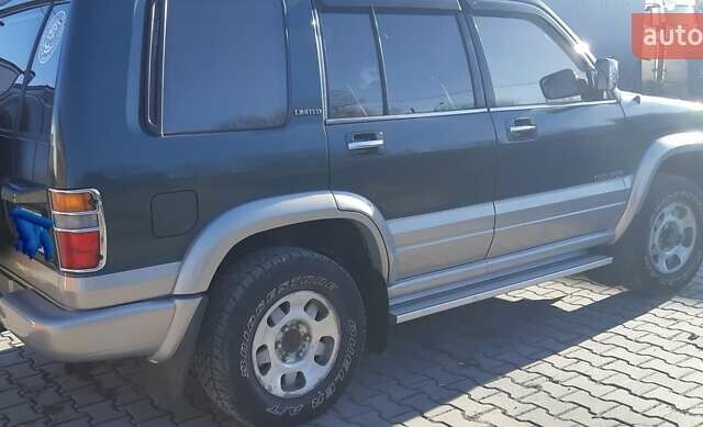Зелений Ісузу Trooper, об'ємом двигуна 2.54 л та пробігом 300 тис. км за 6500 $, фото 9 на Automoto.ua