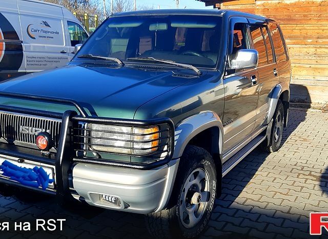 Зелений Ісузу Trooper, об'ємом двигуна 2.6 л та пробігом 300 тис. км за 7000 $, фото 1 на Automoto.ua