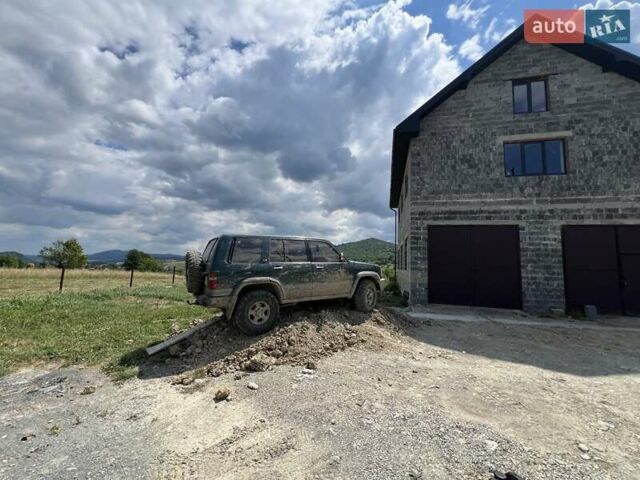 Зелений Ісузу Trooper, об'ємом двигуна 3.1 л та пробігом 190 тис. км за 7480 $, фото 2 на Automoto.ua