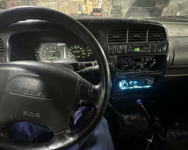 Зелений Ісузу Trooper, об'ємом двигуна 3.1 л та пробігом 190 тис. км за 7480 $, фото 12 на Automoto.ua