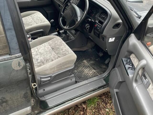 Зелений Ісузу Trooper, об'ємом двигуна 3 л та пробігом 160 тис. км за 2850 $, фото 4 на Automoto.ua