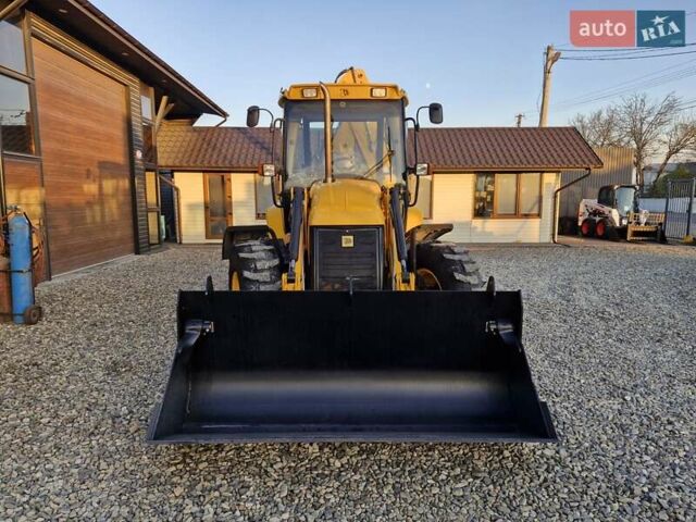 Желтый ЖЦБ 3ЦКС, объемом двигателя 4.4 л и пробегом 540 тыс. км за 58140 $, фото 1 на Automoto.ua