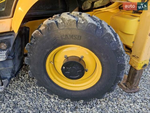 Желтый ЖЦБ 3ЦКС, объемом двигателя 4.4 л и пробегом 540 тыс. км за 58140 $, фото 10 на Automoto.ua