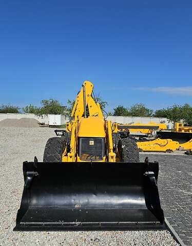Жовтий ЖЦБ 4ЦКС, об'ємом двигуна 4 л та пробігом 100 тис. км за 25000 $, фото 2 на Automoto.ua