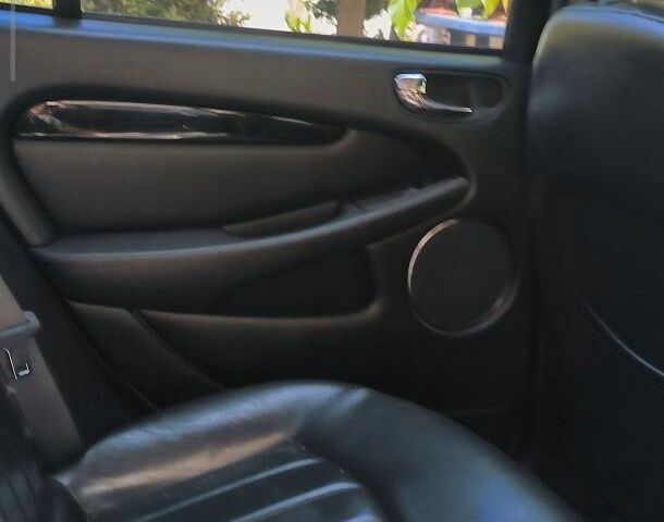 Серый Ягуар Е-Тайп, объемом двигателя 2.5 л и пробегом 167 тыс. км за 3779 $, фото 2 на Automoto.ua