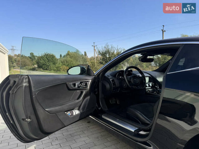 Черный Ягуар Ф-Тайп, объемом двигателя 3 л и пробегом 158 тыс. км за 22550 $, фото 10 на Automoto.ua