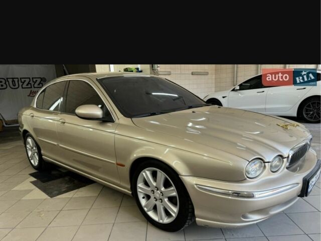 Бежевый Ягуар Х-Тайп, объемом двигателя 3 л и пробегом 214 тыс. км за 5500 $, фото 1 на Automoto.ua