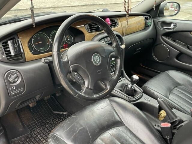 Черный Ягуар Х-Тайп, объемом двигателя 2.5 л и пробегом 142 тыс. км за 4200 $, фото 11 на Automoto.ua