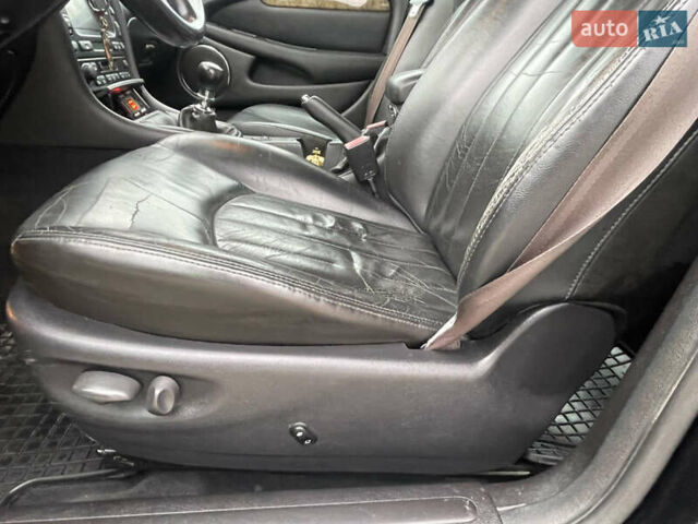 Черный Ягуар Х-Тайп, объемом двигателя 2.5 л и пробегом 142 тыс. км за 4200 $, фото 17 на Automoto.ua