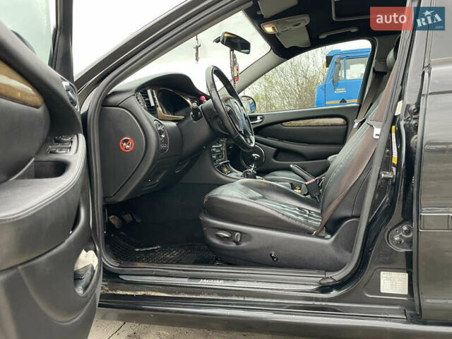 Черный Ягуар Х-Тайп, объемом двигателя 2.5 л и пробегом 142 тыс. км за 4200 $, фото 10 на Automoto.ua