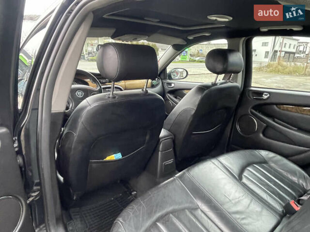 Черный Ягуар Х-Тайп, объемом двигателя 2.5 л и пробегом 142 тыс. км за 4200 $, фото 20 на Automoto.ua