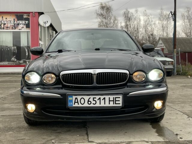 Черный Ягуар Х-Тайп, объемом двигателя 2.5 л и пробегом 142 тыс. км за 4200 $, фото 8 на Automoto.ua