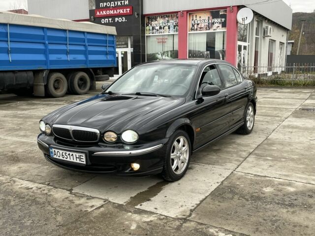 Черный Ягуар Х-Тайп, объемом двигателя 2.5 л и пробегом 142 тыс. км за 4200 $, фото 7 на Automoto.ua