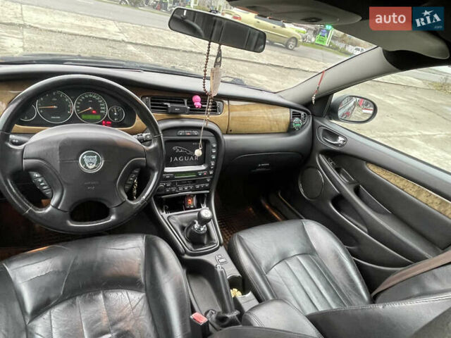 Черный Ягуар Х-Тайп, объемом двигателя 2.5 л и пробегом 142 тыс. км за 4200 $, фото 21 на Automoto.ua