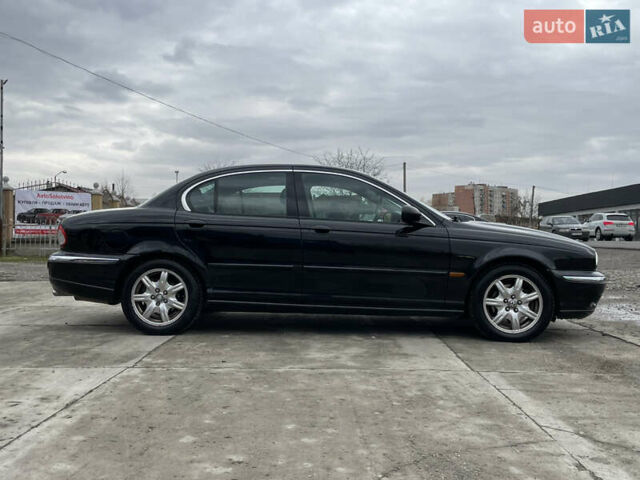 Черный Ягуар Х-Тайп, объемом двигателя 2.5 л и пробегом 142 тыс. км за 4200 $, фото 3 на Automoto.ua