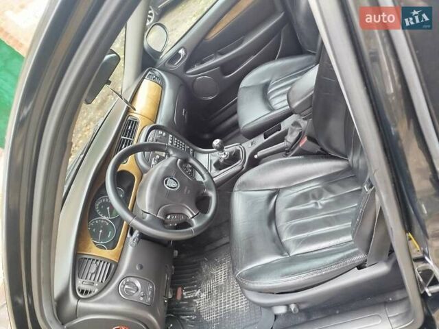 Чорний Ягуар Х-Тайп, об'ємом двигуна 2.5 л та пробігом 294 тис. км за 4600 $, фото 5 на Automoto.ua