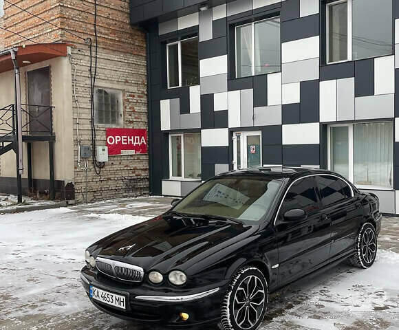 Черный Ягуар Х-Тайп, объемом двигателя 2.5 л и пробегом 370 тыс. км за 5500 $, фото 4 на Automoto.ua