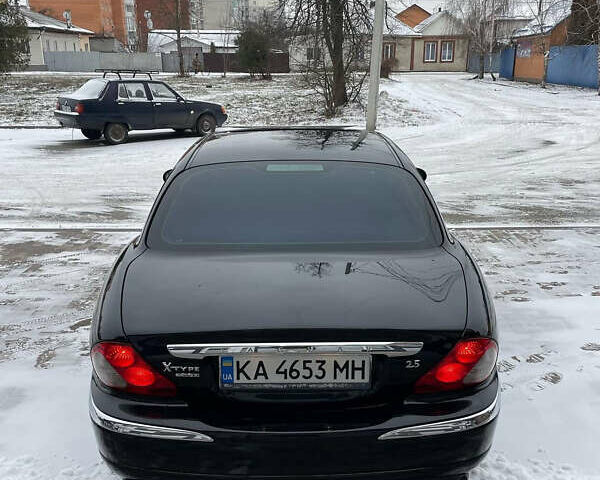 Черный Ягуар Х-Тайп, объемом двигателя 2.5 л и пробегом 370 тыс. км за 5500 $, фото 7 на Automoto.ua