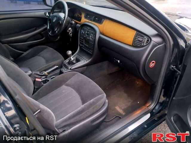 Ягуар Х-Тайп 2004 в Киеве на Automoto.ua Черный Ягуар Х-Тайп, объемом двигателя 2 л и пробегом 298 тыс. км за 4800 $, фото 7 на Automoto.ua