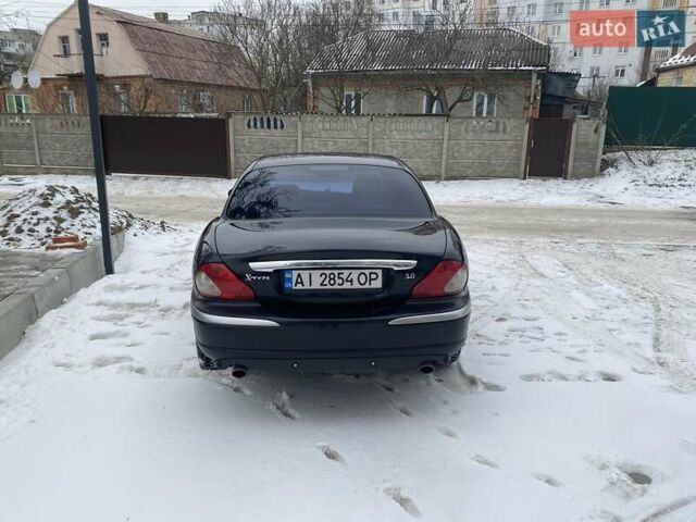Черный Ягуар Х-Тайп, объемом двигателя 3 л и пробегом 170 тыс. км за 7500 $, фото 8 на Automoto.ua