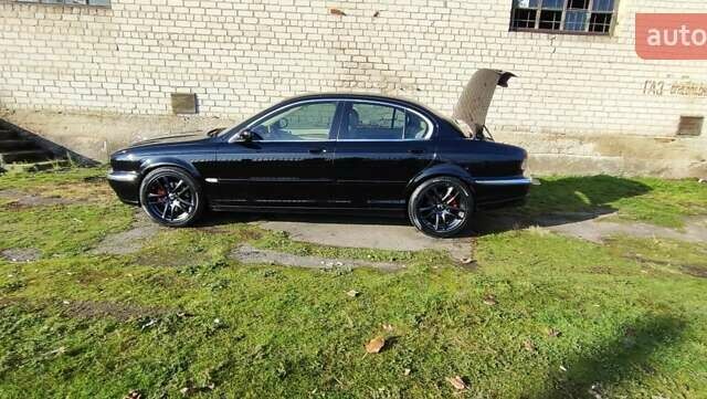 Чорний Ягуар Х-Тайп, об'ємом двигуна 2.97 л та пробігом 135 тис. км за 5500 $, фото 1 на Automoto.ua
