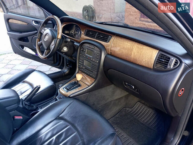 Ягуар Х-Тайп 2006 в Хмельницком на Automoto.ua Черный Ягуар Х-Тайп, объемом двигателя 2.5 л и пробегом 193 тыс. км за 5700 $, фото 3 на Automoto.ua