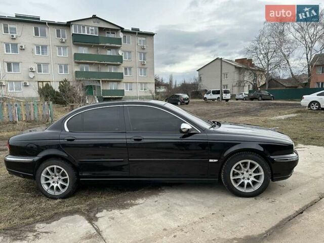 Чорний Ягуар Х-Тайп, об'ємом двигуна 2.1 л та пробігом 132 тис. км за 6200 $, фото 1 на Automoto.ua