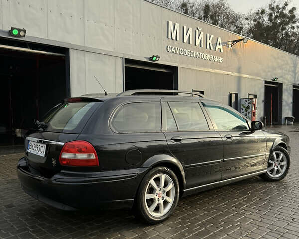 Черный Ягуар Х-Тайп, объемом двигателя 2 л и пробегом 335 тыс. км за 5400 $, фото 6 на Automoto.ua