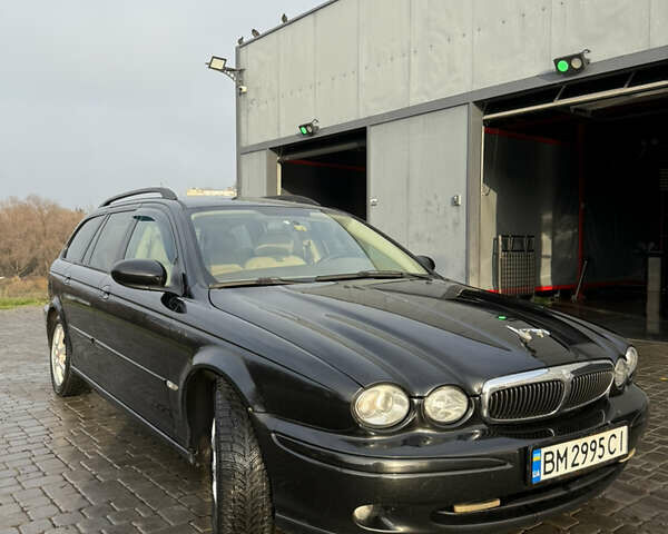 Черный Ягуар Х-Тайп, объемом двигателя 2 л и пробегом 335 тыс. км за 5400 $, фото 3 на Automoto.ua