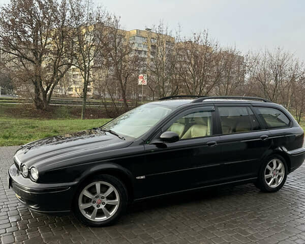 Черный Ягуар Х-Тайп, объемом двигателя 2 л и пробегом 335 тыс. км за 5400 $, фото 9 на Automoto.ua