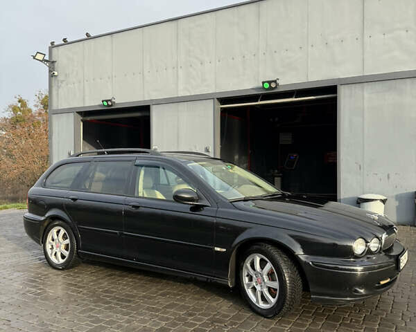 Черный Ягуар Х-Тайп, объемом двигателя 2 л и пробегом 335 тыс. км за 5400 $, фото 4 на Automoto.ua