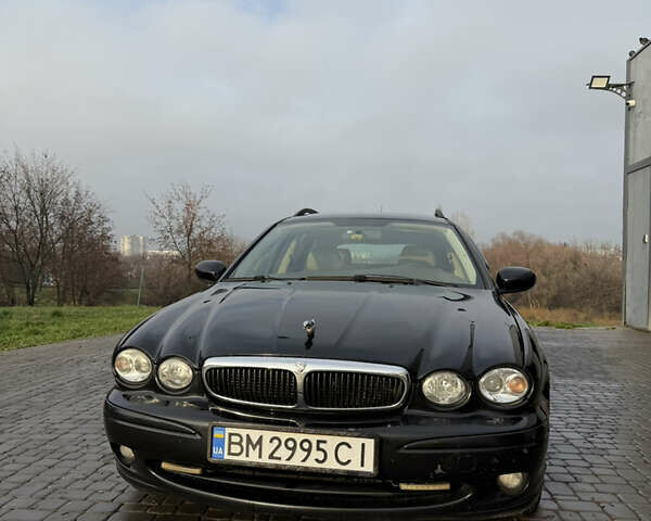 Черный Ягуар Х-Тайп, объемом двигателя 2 л и пробегом 335 тыс. км за 5400 $, фото 1 на Automoto.ua