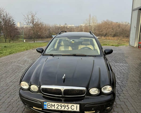 Черный Ягуар Х-Тайп, объемом двигателя 2 л и пробегом 335 тыс. км за 5400 $, фото 2 на Automoto.ua