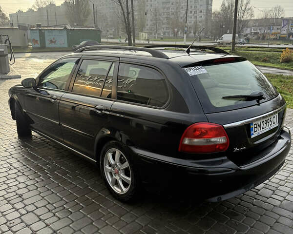 Черный Ягуар Х-Тайп, объемом двигателя 2 л и пробегом 335 тыс. км за 5400 $, фото 7 на Automoto.ua