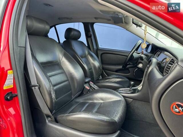 Красный Ягуар Х-Тайп, объемом двигателя 2 л и пробегом 280 тыс. км за 4790 $, фото 11 на Automoto.ua