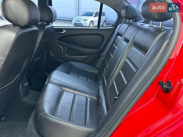 Красный Ягуар Х-Тайп, объемом двигателя 2 л и пробегом 280 тыс. км за 4790 $, фото 9 на Automoto.ua