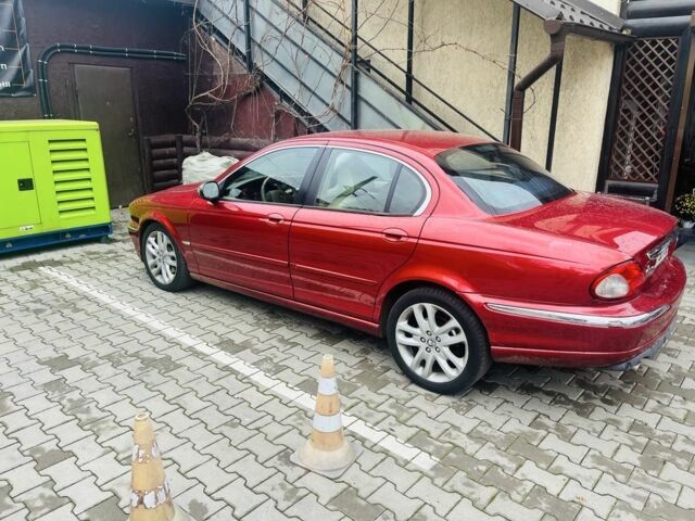 Красный Ягуар Х-Тайп, объемом двигателя 2.5 л и пробегом 237 тыс. км за 4250 $, фото 1 на Automoto.ua