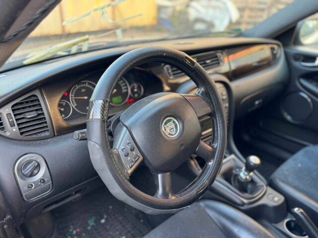 Серый Ягуар Х-Тайп, объемом двигателя 2 л и пробегом 350 тыс. км за 3300 $, фото 6 на Automoto.ua