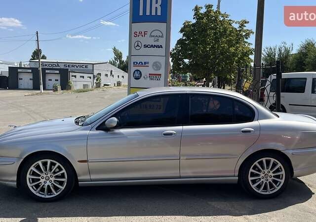 Сірий Ягуар Х-Тайп, об'ємом двигуна 3 л та пробігом 155 тис. км за 4800 $, фото 4 на Automoto.ua