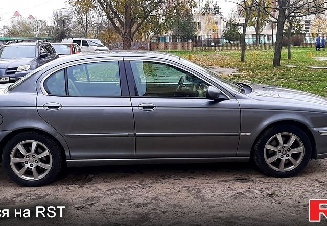 Серый Ягуар Х-Тайп, объемом двигателя 2 л и пробегом 222 тыс. км за 5500 $, фото 4 на Automoto.ua