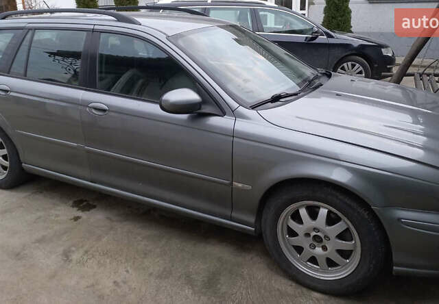 Сірий Ягуар Х-Тайп, об'ємом двигуна 2 л та пробігом 330 тис. км за 3218 $, фото 6 на Automoto.ua