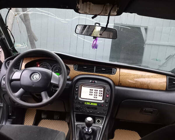 Сірий Ягуар Х-Тайп, об'ємом двигуна 2 л та пробігом 330 тис. км за 3218 $, фото 5 на Automoto.ua