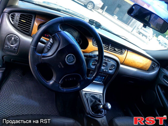 Синий Ягуар Х-Тайп, объемом двигателя 2.1 л и пробегом 203 тыс. км за 5300 $, фото 9 на Automoto.ua