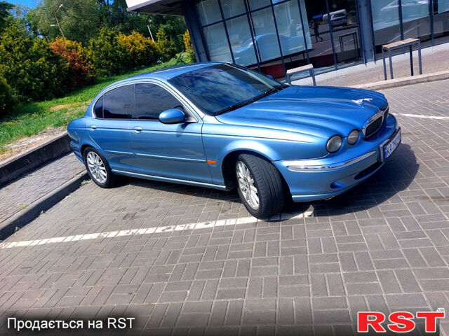 Синий Ягуар Х-Тайп, объемом двигателя 2.1 л и пробегом 203 тыс. км за 5300 $, фото 4 на Automoto.ua